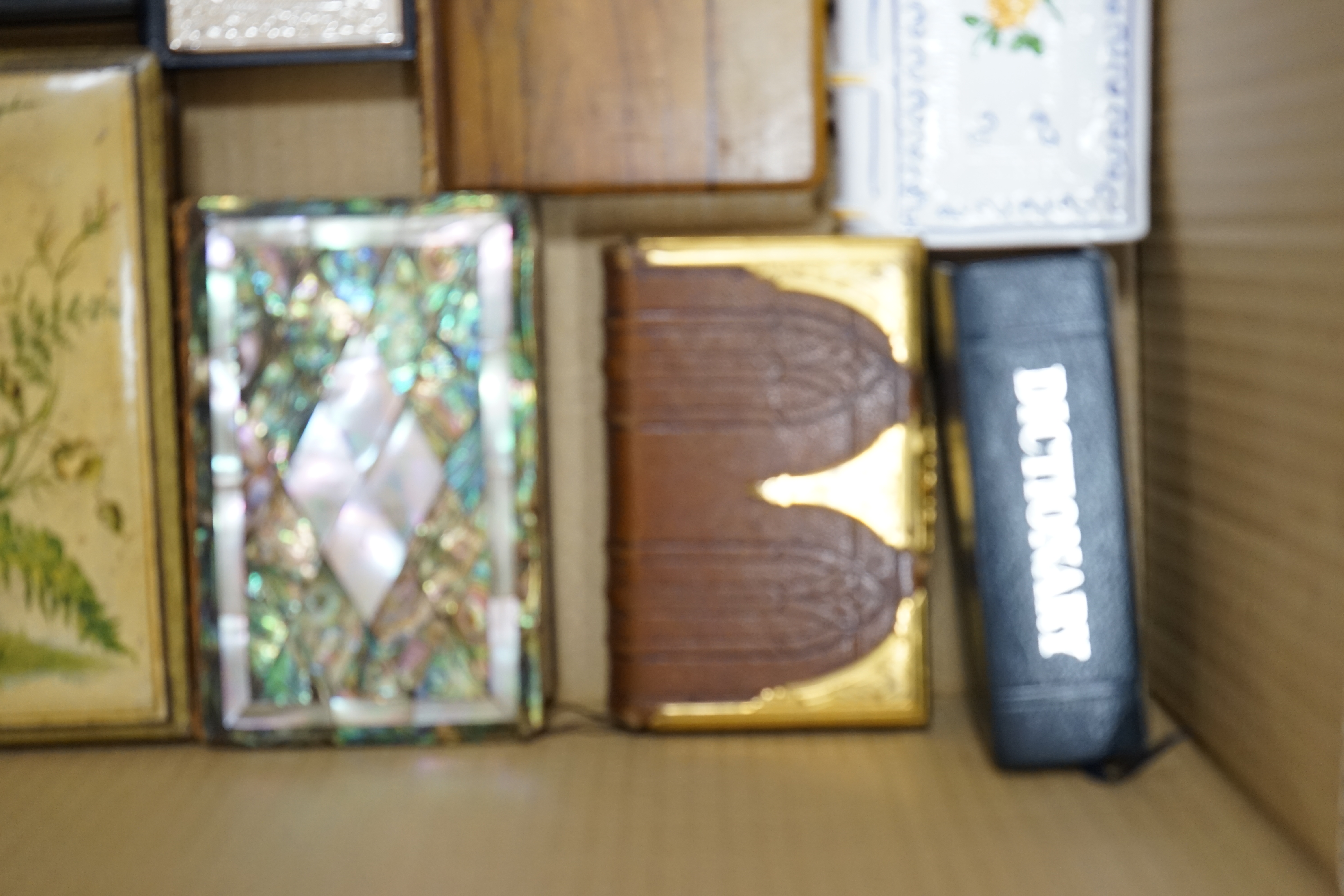 A small group of other assorted novelty bindings, including mother of pearl, leather and silver plate. Condition - varies